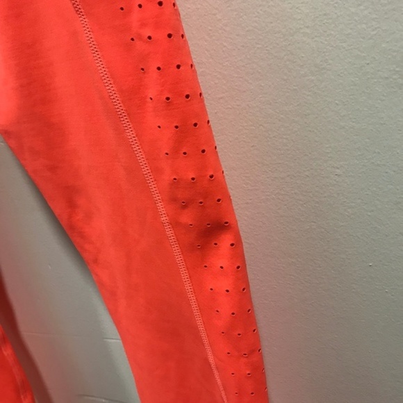 NWOT Athleta Neon Orange Laser Cut Leggings - Picture 3 of 6
